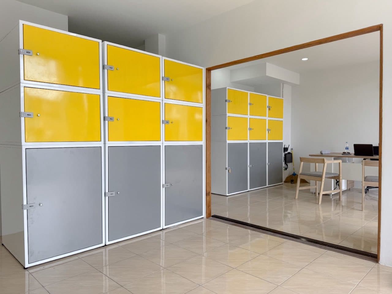 The wall of yellow and grey lockers inside the shop